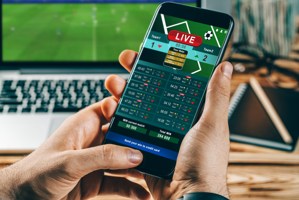usuário apostando no celular durante a Copa do Mundo 2026 com app de apostas